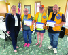 Lion District Governor, Kami Anderson, initiated Holly Mantei, Jennifer Kasprowicz, and Scott Asmus as new members in the Karlstad Lions Club at their June meeting.