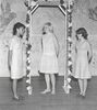 Circa 1965 – The 8th Grade Style Show sponsored by the 8th grade Home Economics Class.
From left to right are Colleen Undeberg, JoAnn Celany and Corrine Folland.
